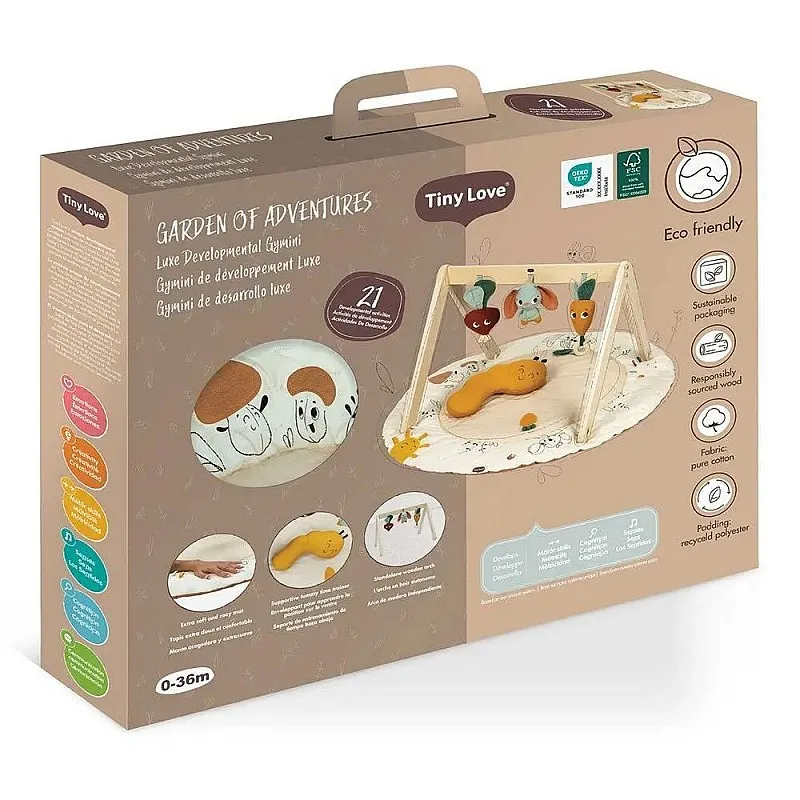 Еко Активна гимнастика Tiny Love Luxe Gymini от серията Garden of Adventures, с кръгло килимче с диаметър 90 см, дървена арка, 3 играчки и възглавница за игра по корем, 0м+
